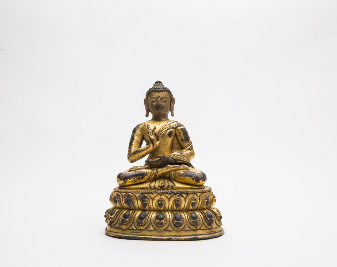A GILT-BRONZE FIGURE OF SAKYAMUNI (1 of 4)