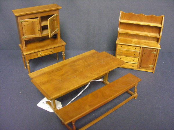 W. DICK DOLLHOUSE FURNITURE HAND MADE DESIGNER: W. DICK DOLL HOUSE FURNITURE Mr. Dick was a maker of fine doll house furniture in the 1950's, This lot has a tressel table with 2 benches and 2 china cabinets,