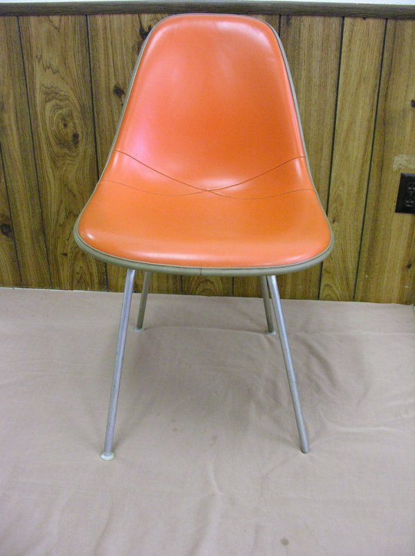 HERMAN MILLER FIBERGLASS CHROME AND VINYL CHAIR: HERMAN MILLER FIBERGLASS CHROME AND VINYL CHAIR . Impressed Herman Miller on the chair bottom. Condition: One plastic leveler off, very light usage. Size: 31 1/4'' high by 18'' wide.