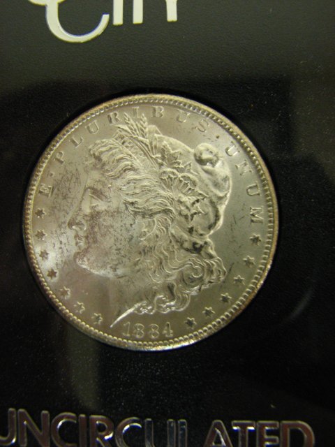 1884 CC US MORGAN SILVER DOLLAR - 4