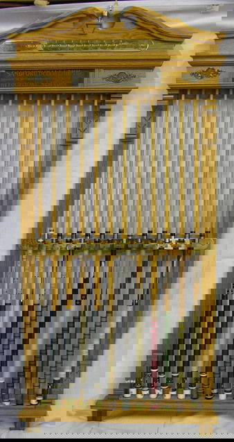 BRUNSWICK LOCKING CUE RACK: BRUNSWICK LOCKING CUE RACK labeled Sanfored, Bell, and Lahm, INC. Branch of the Brunswick, Balke, Collender co. of New York, 61 Fourth Ave. New York, 12 locks with keys.Cues do not come with rack.