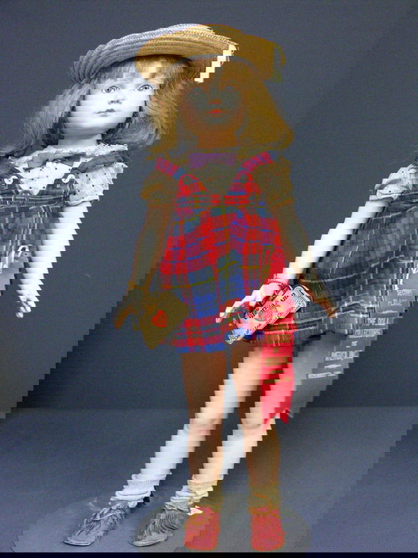 19IN EFFANBEE GLORIA ANN DOLL: 19IN EFFANBEE GLORIA ANN DOLL All composition body, socket head, name on body ''Gloria Ann'', Dewees Cochran Boston Doll maker, purse and heart tag on right arm, original brown hair, Costume: all orig