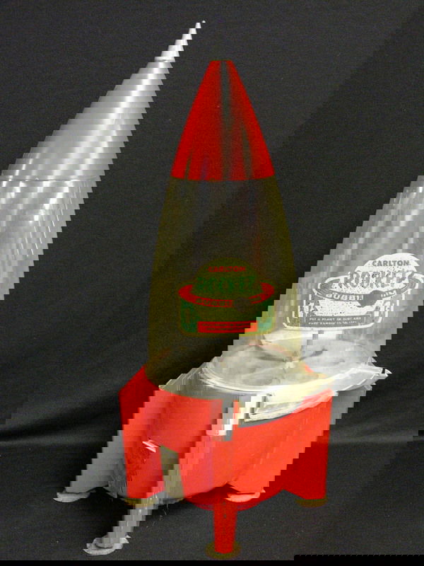 CARLTON 1 CENT ROCKET GUMBALL MACHINE: CARLTON 1 CENT ROCKET GUMBALL MACHINE Circa 1950's 1 cent rocket gumball/bubble gum machine, All plastic except for the metal vending wheel coin door and chute flap, Promotional machine given to vendo