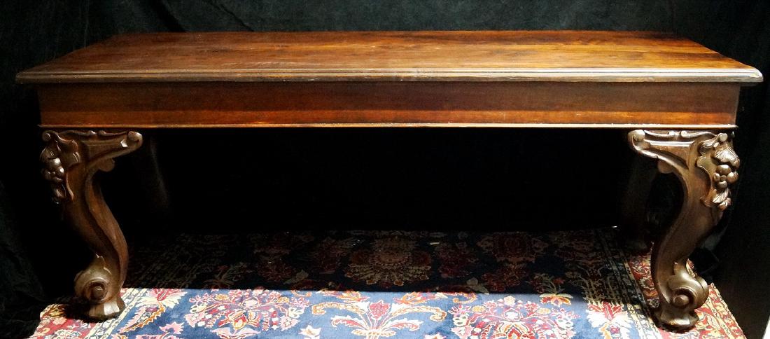 VICTORIAN ROSEWOOD DESK: VICTORIAN ROSEWOOD DESK WITH HEAVILY CARVED PIANO LEGS 30"H 78"L 30"D