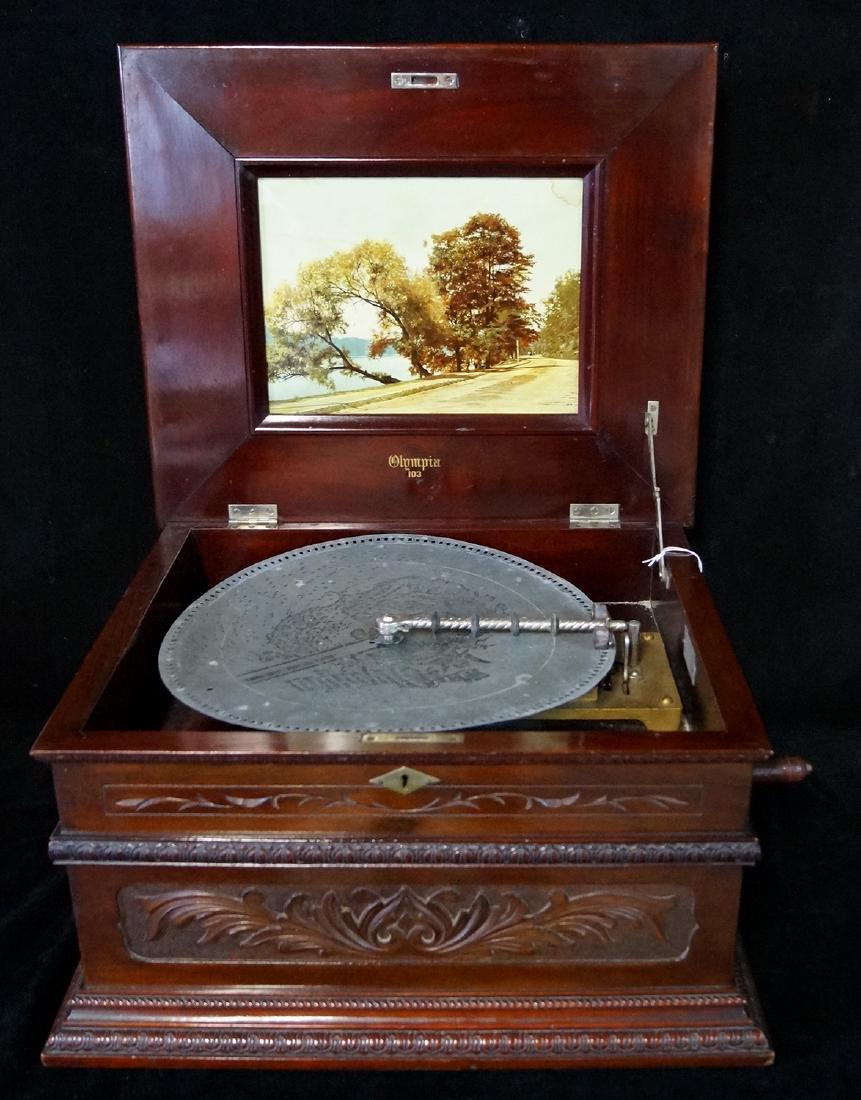 OLYMPIA CARVED CASE DOUBLE COMB DISK PLAYER (1 of 8)