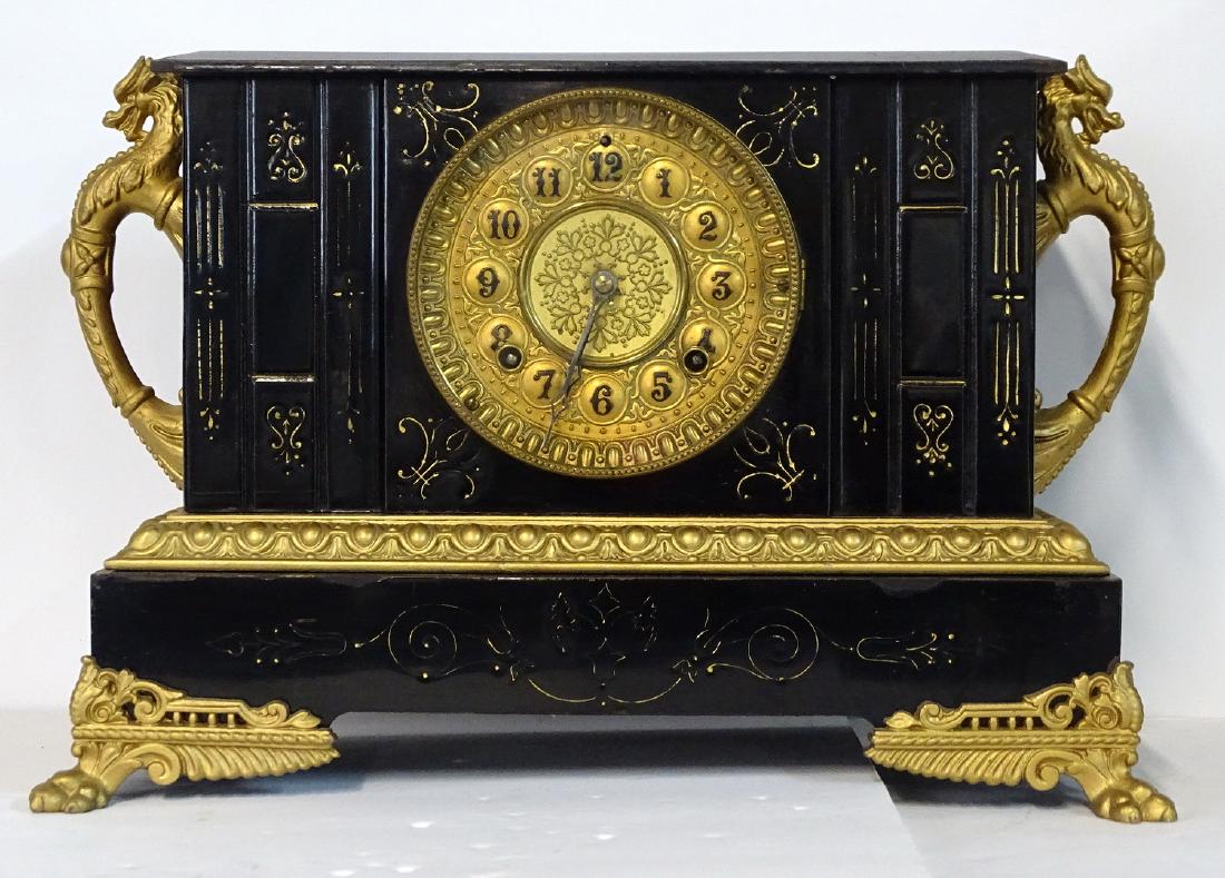 ANSONIA "SICILY" METAL MANTLE CLOCK WITH GARGOYLE: ANSONIA "SICILY" METAL MANTLE CLOCK WITH GARGOYLE MOUNTS & TALLON FEET 11.5"H 16"W 7"D