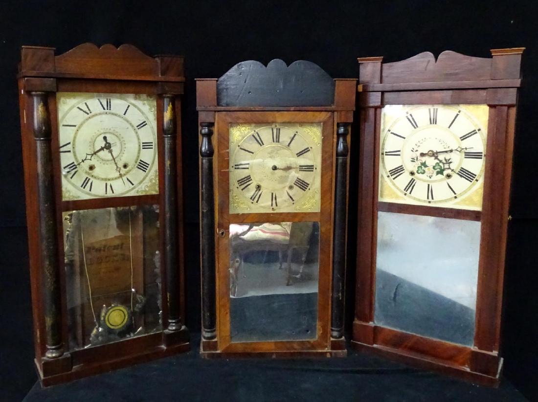 3 WEIGHT DRIVEN SHELF CLOCKS (1) B&T ATKINS, (1): 3 WEIGHT DRIVEN SHELF CLOCKS (1) B&T ATKINS, (1) CHARLES STRANTON (1) ELI TERRY (2) WITH MIRRORED TABLETS 33"H 16"W 5"D LARTGEST