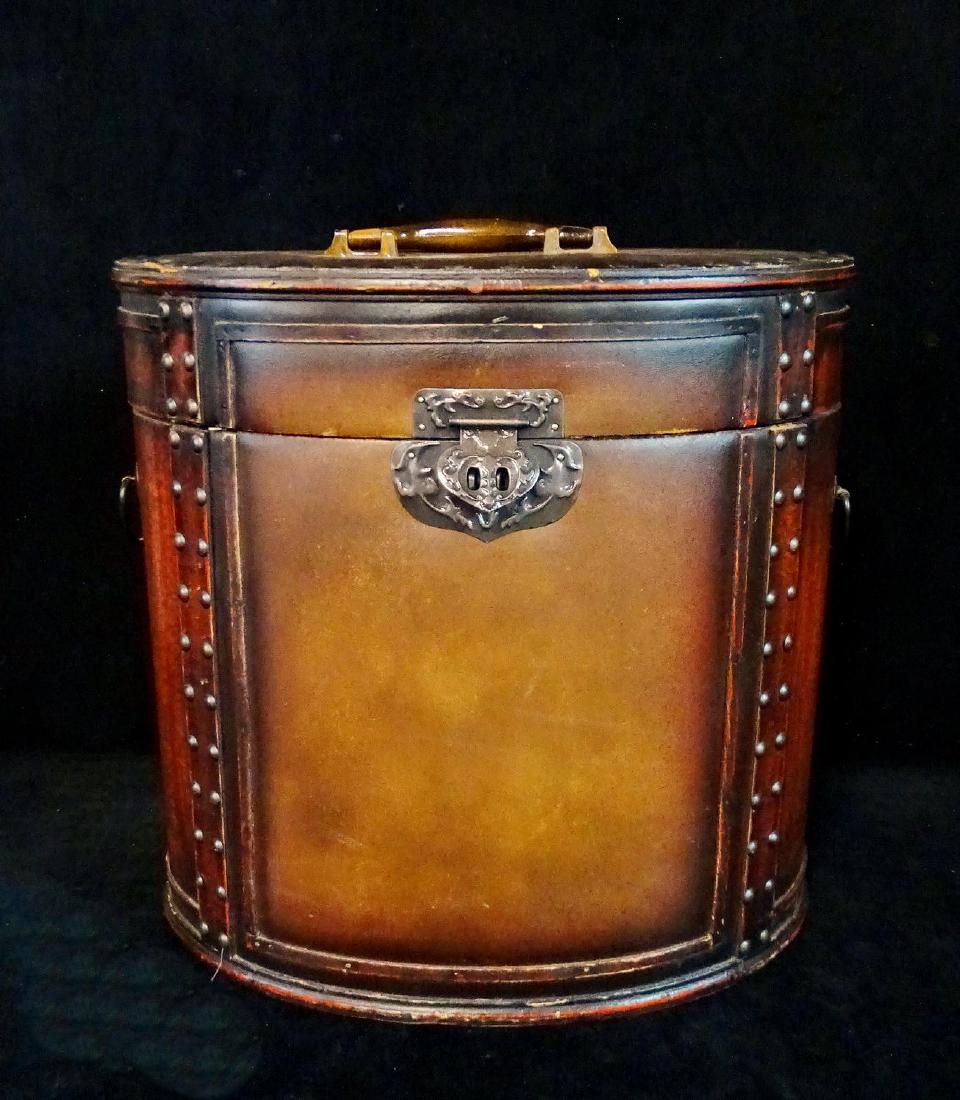 FAUX LEATHER OVAL BOX: FAUX LEATHER OVAL BOX 14"H 15"W 11"D