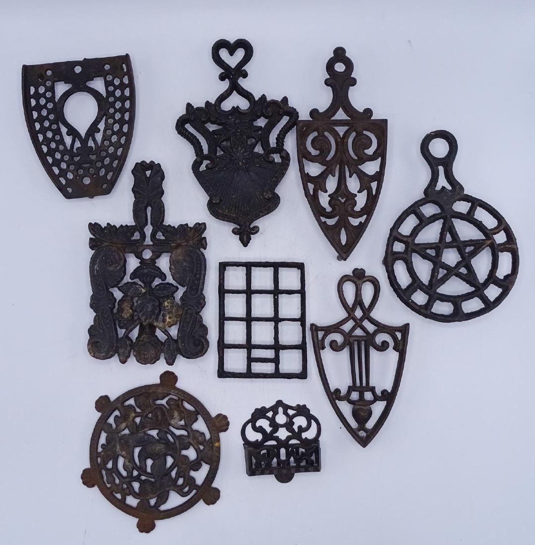 GROUP VINTAGE WROUGHT IRON TRIVETS & MATCH HOLDER: GROUP VINTAGE WROUGHT IRON TRIVETS & MATCH HOLDER