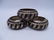 3 NIELLO STYLE STRIPED METAL BANGLES (GEOFFREY BEENE