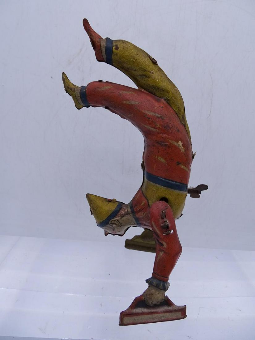 GUNTHERMAN WIND-UP TIN TOY CLOWN WALKING ON HANDS 7"H: GUNTHERMAN WIND-UP TIN TOY CLOWN WALKING ON HANDS 7"H