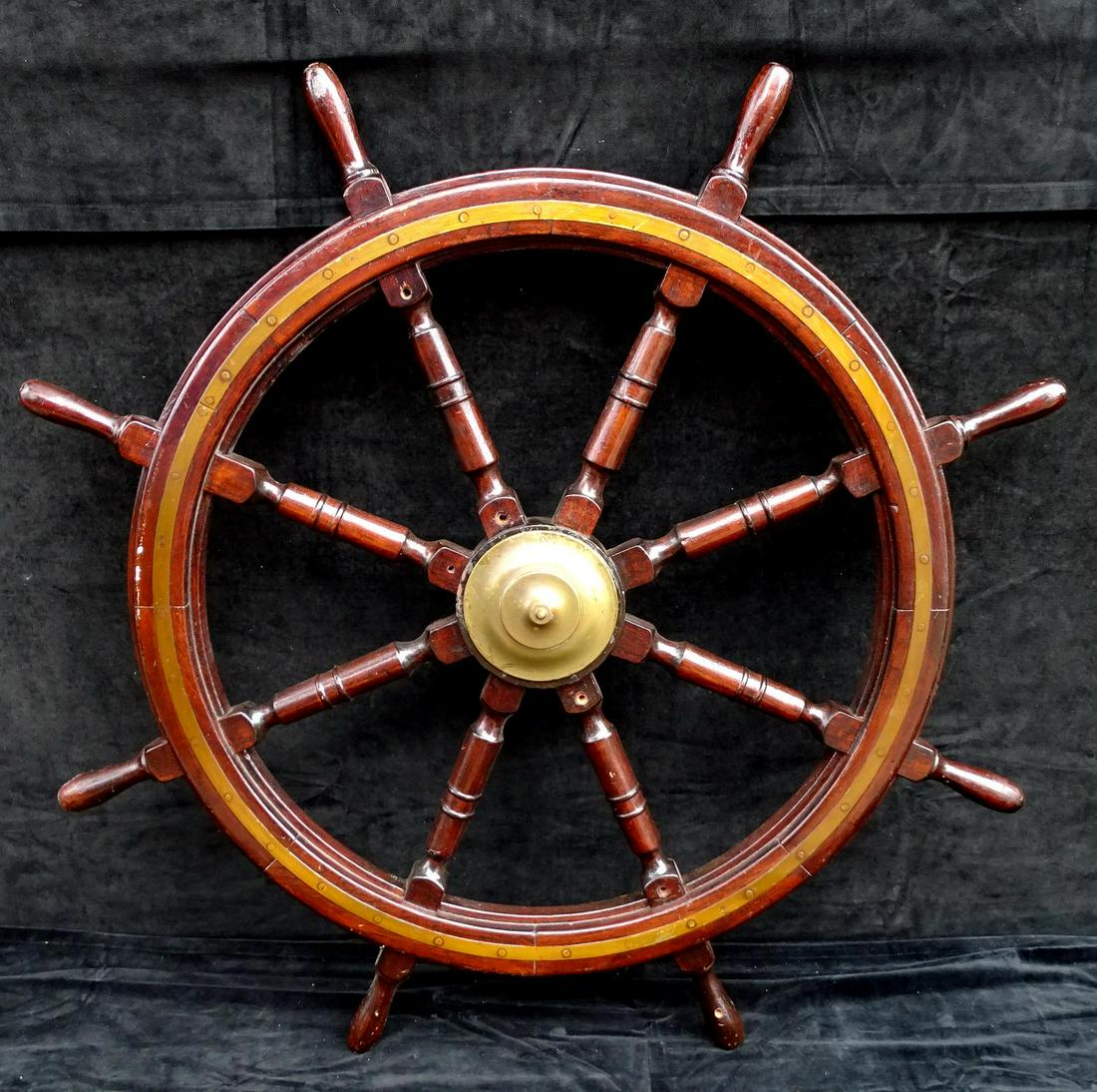 VINTAGE 8 SPOKE SHIPS WHEEL WITH BRASS MOUNTS 52" DIA.: VINTAGE 8 SPOKE SHIPS WHEEL WITH BRASS MOUNTS 52" DIA.