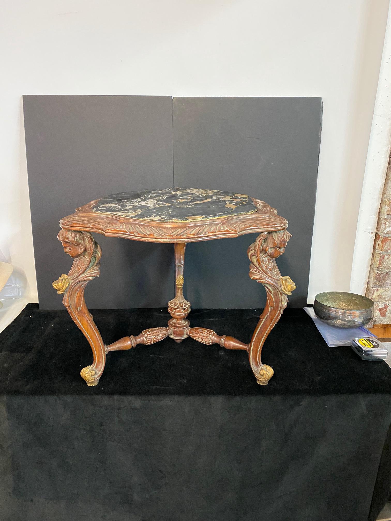 3 LEGGED CARVED TABLE WITH ANGEL MOTIF WITH MARBLE TOP (1 of 4)