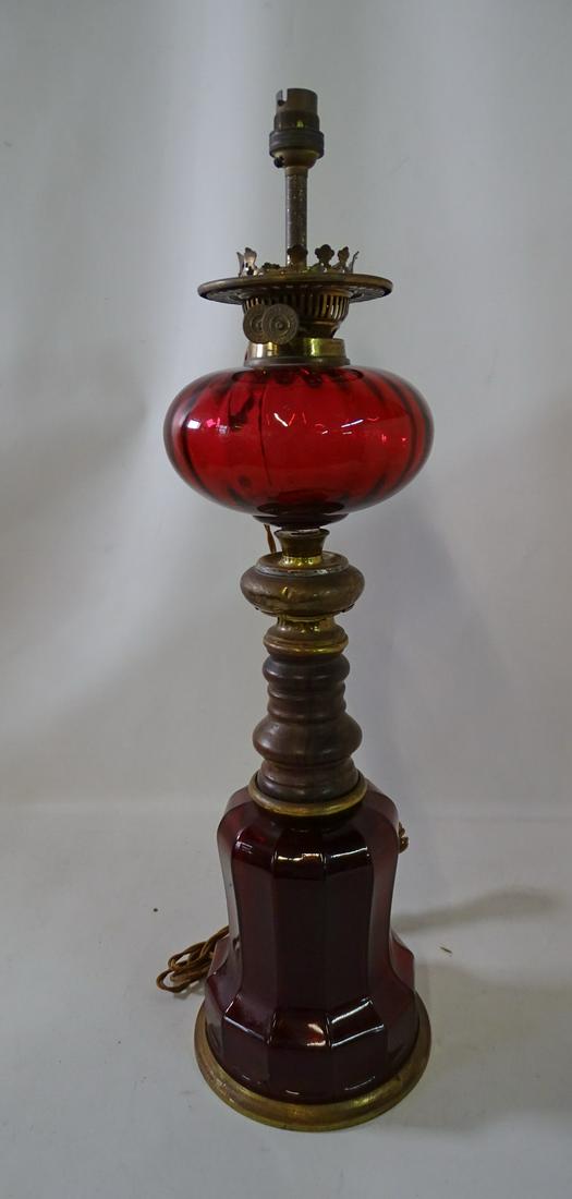 CRANBERRY GLASS LAMP, ELECTRIFIED 26" X 7" DIA.: CRANBERRY GLASS LAMP, ELECTRIFIED 26" X 7" DIA.