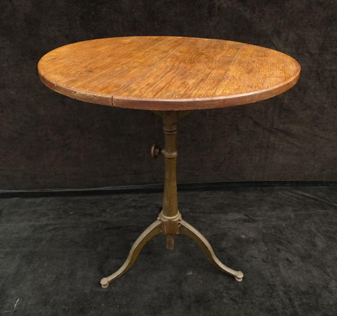 19TH CENTURY IRON BASED ADJUSTABLE TABLE W/OAK TOP 29.5" X 26" DIA. (1 of 6)