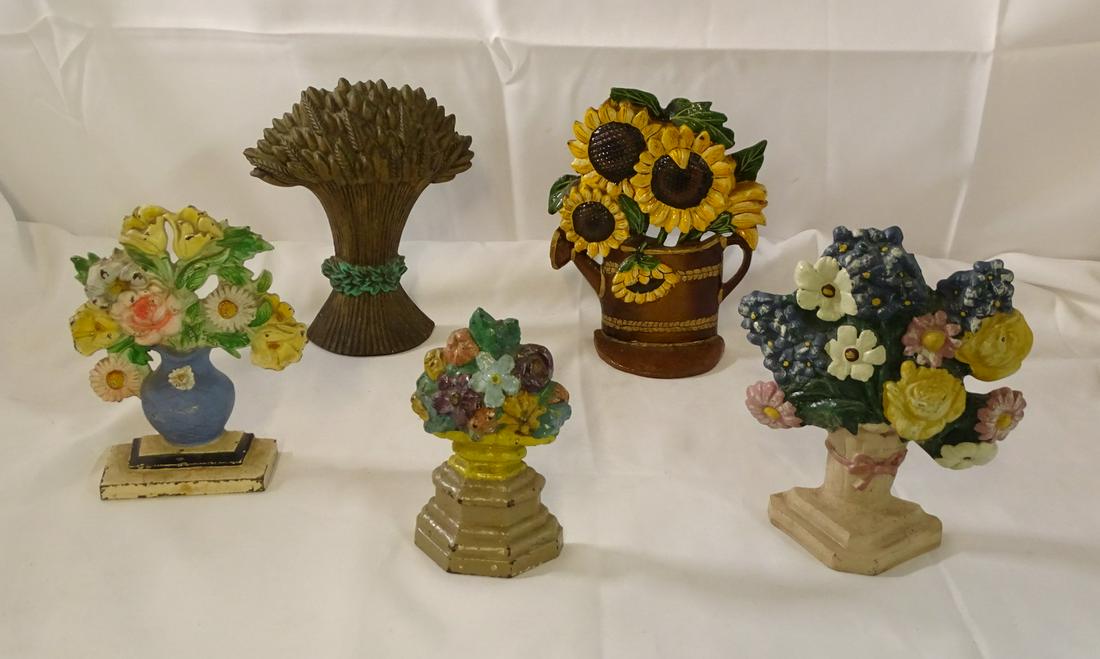 GROUP OF 5 CAST IRON DOOR STOPS [FLORAL] (1 of 12)