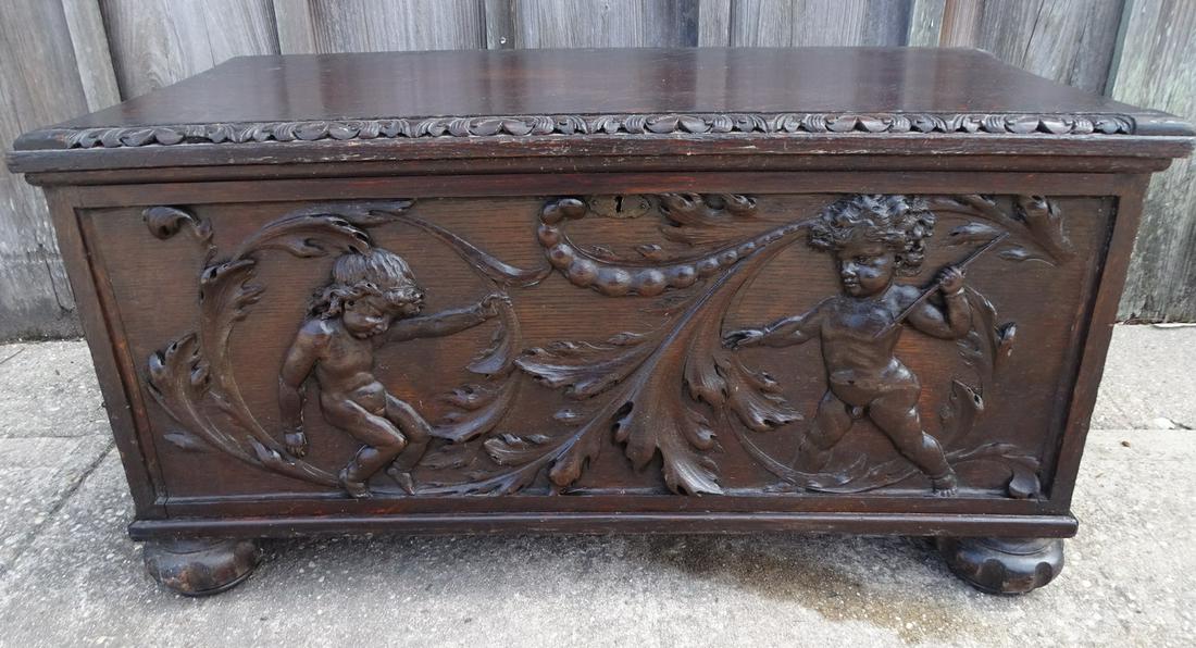 CARVED WOOD BLANKET CHEST W/CHERUB MOTIF (1 of 11)