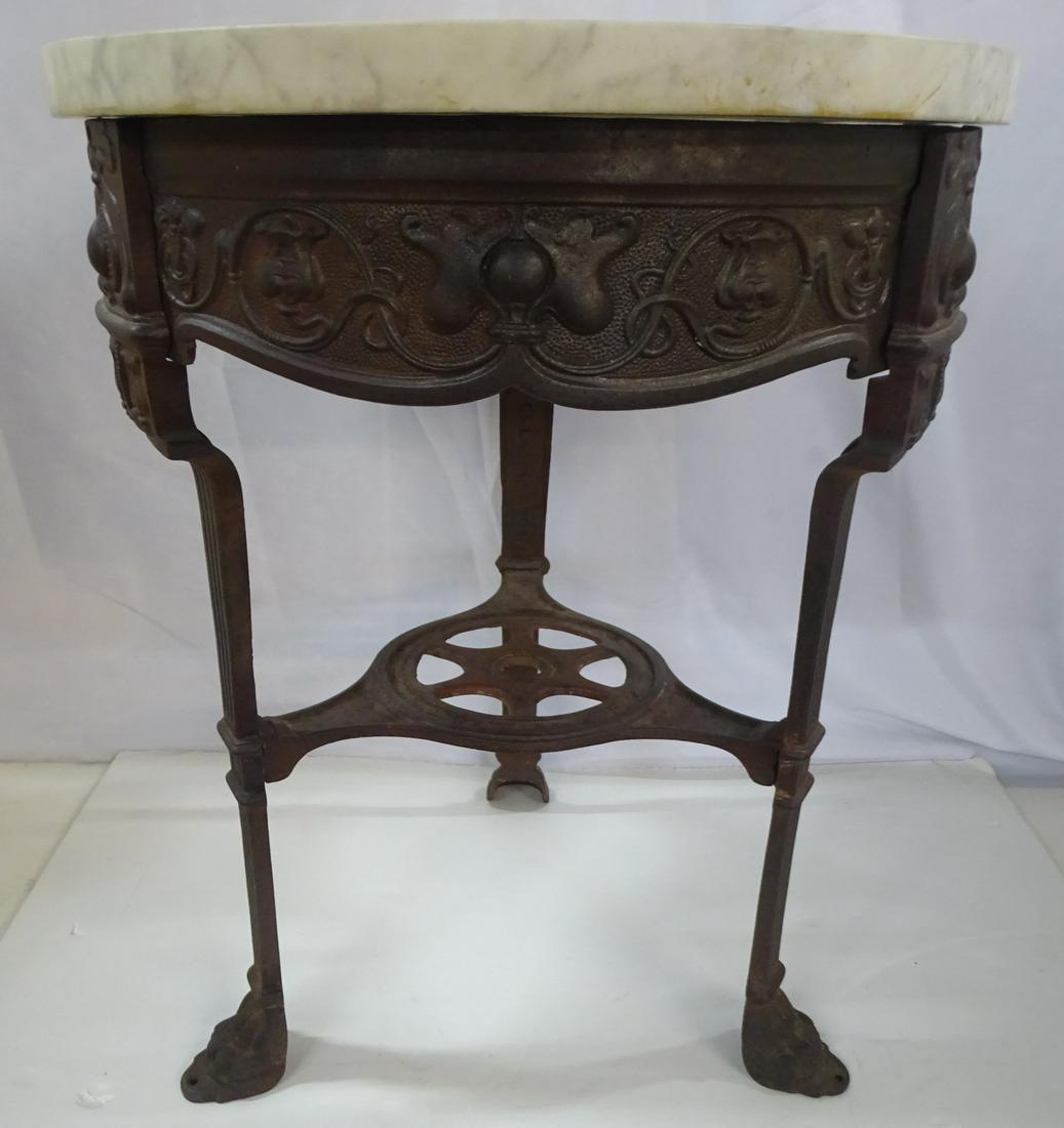 IRON MARBLE TOPPED CLAW FOOT CIRCULAR TABLE 30.75 X 24.5 DIA.: IRON MARBLE TOPPED CLAW FOOT CIRCULAR TABLE 30.75 X 24.5 DIA.