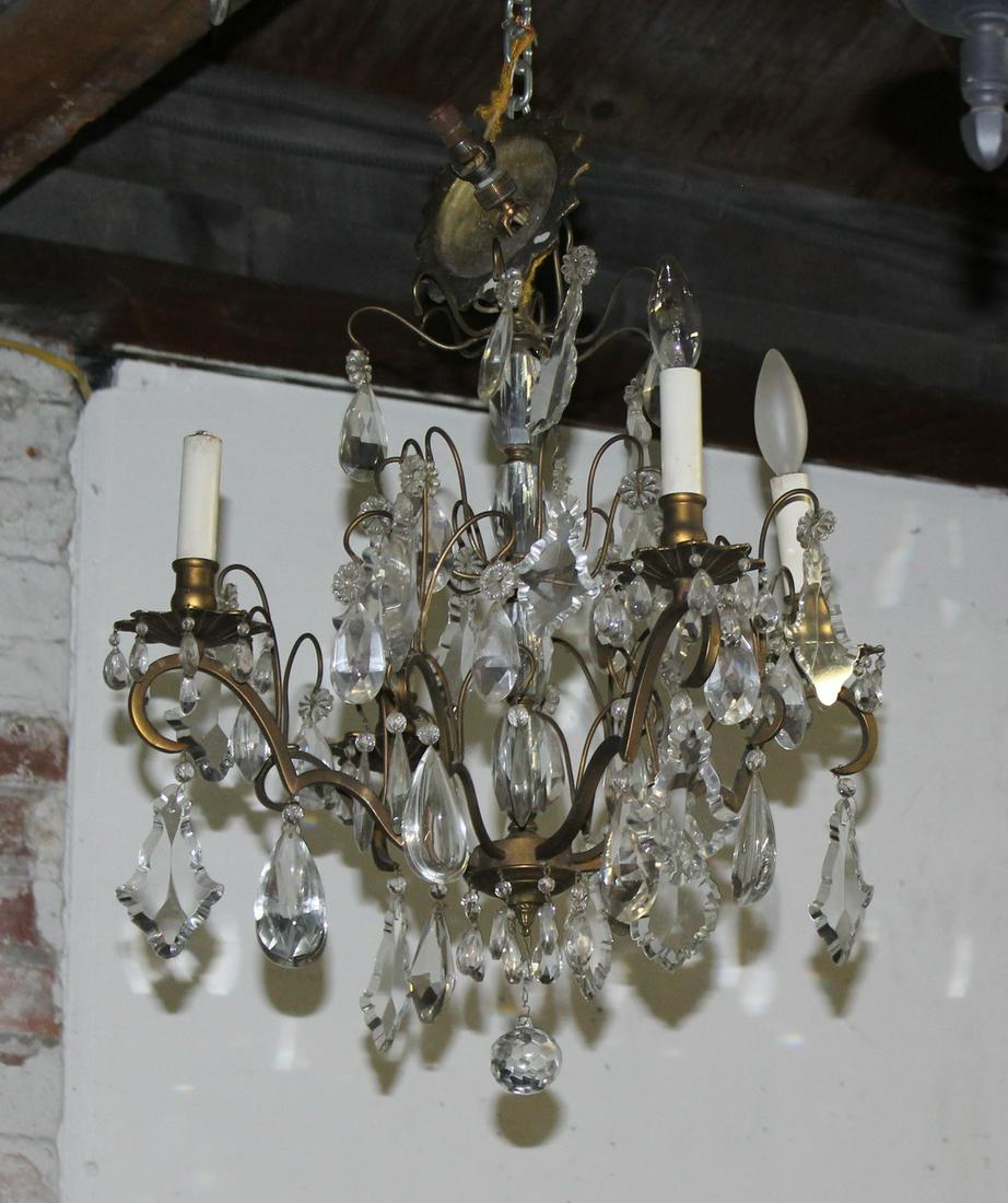 GILT, CUT AND POLISHED CRYSTAL CHANDELIER 20" ACROSS: GILT, CUT AND POLISHED CRYSTAL CHANDELIER 20" ACROSS