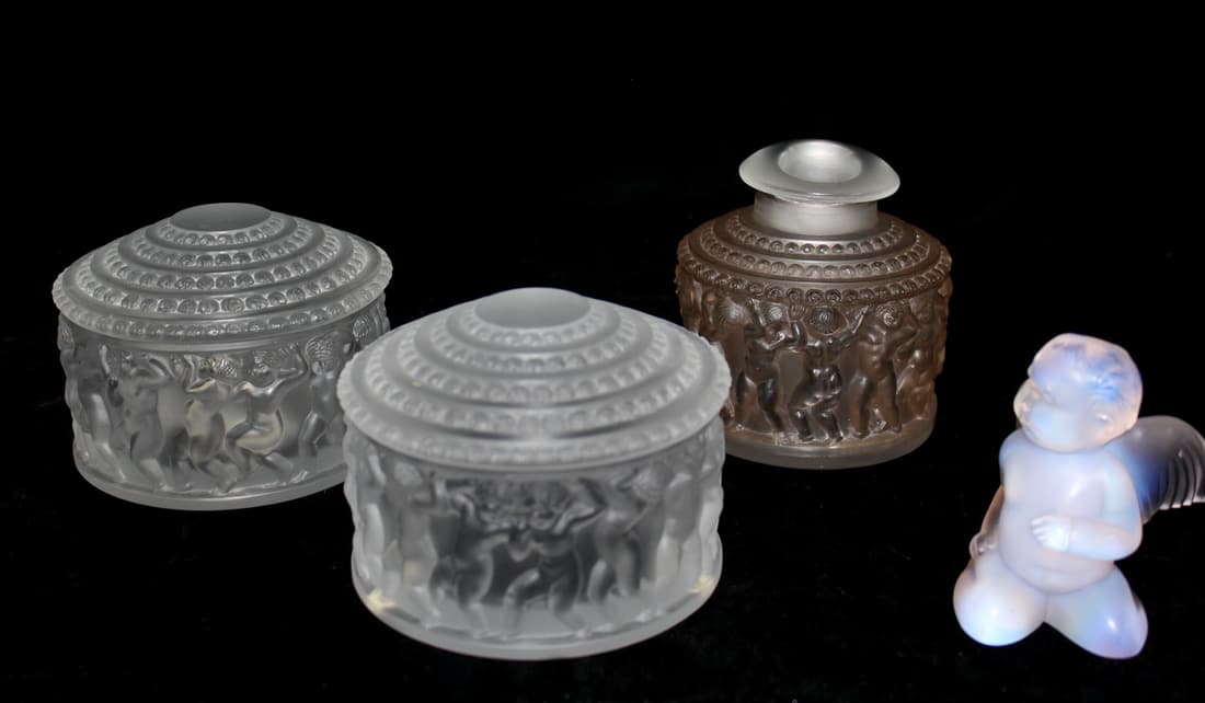 THREE LALIQUE DRESSER JARS AND LALIQUE CRYSTAL CUPID, STOPPER HAS CHIP, WING HAS FLEA BITE (S138): THREE LALIQUE DRESSER JARS AND LALIQUE CRYSTAL CUPID, STOPPER HAS CHIP, WING HAS FLEA BITE (S138)