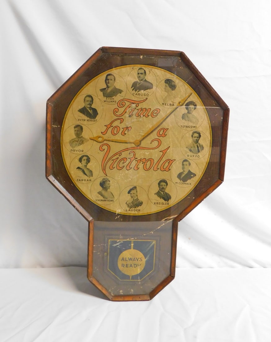 ESTATE OF SEYMOUR STEIN: TIME FOR A VICTROLA" AD IN FAUX CLOCK CASE 29" HIGH X 19 1/2: TIME FOR A VICTROLA" AD IN FAUX CLOCK CASE 29" HIGH X 19 1/2