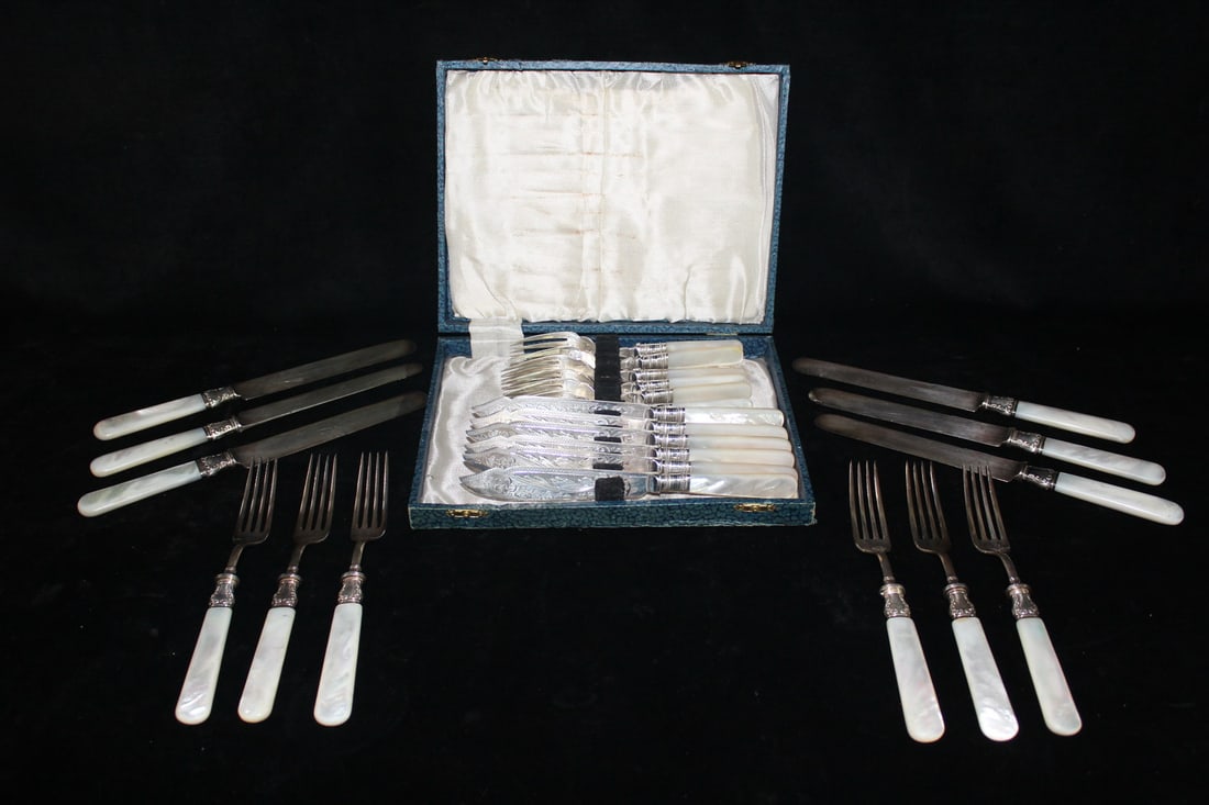 ONE LANDERS FRARY AND CLARK, AND ONE UNMARKED, MOTHER OF PEARL FISH SETS WITH STERLING FERRULES 24: ONE LANDERS FRARY AND CLARK, AND ONE UNMARKED, MOTHER OF PEARL FISH SETS WITH STERLING FERRULES 24 PCS. (V 337)