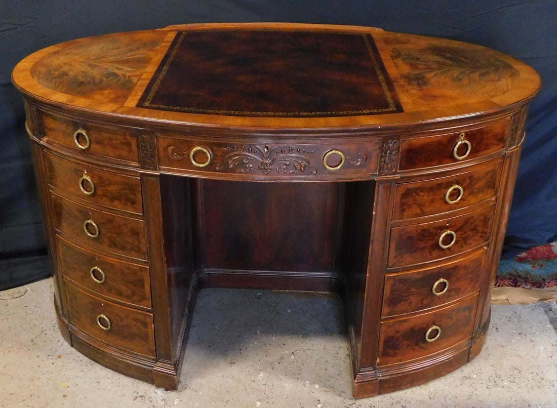 LEATHER TOP MAHOGANY OVAL DESK 29" X 50" X 31": LEATHER TOP MAHOGANY OVAL DESK 29" X 50" X 31"