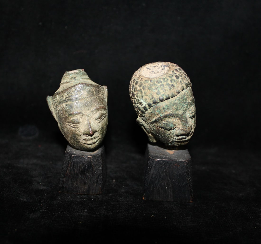 TWO SMALL BRONZE OVER TERRACOTTA? BUDDHA HEADS ON WOOD PLINTHS, 3.25" LARGEST (1 of 9)