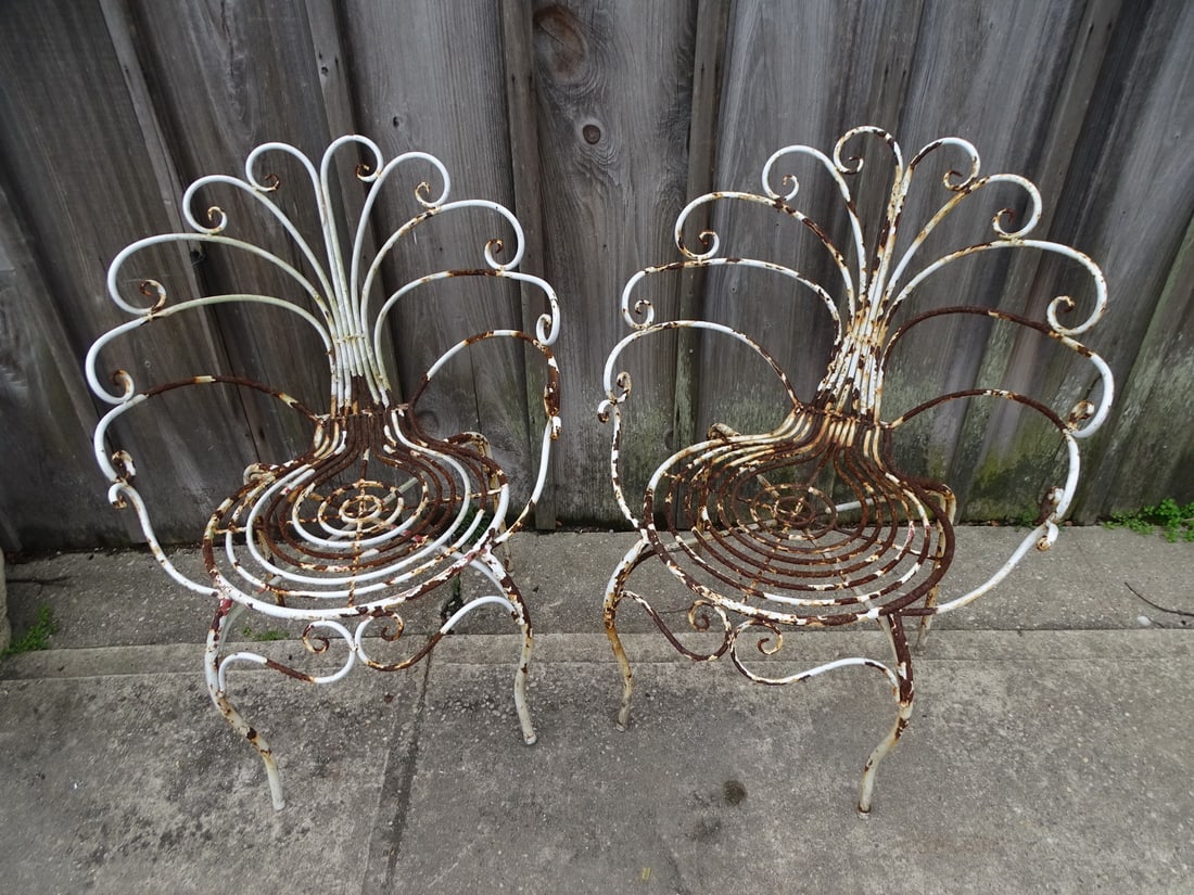 2 WROUGHT IRON PEACOCK BACK ARM CHAIRS. 34 X 27 X 21, SEAT HEIGHT 17": 2 WROUGHT IRON PEACOCK BACK ARM CHAIRS. 34 X 27 X 21, SEAT HEIGHT 17"