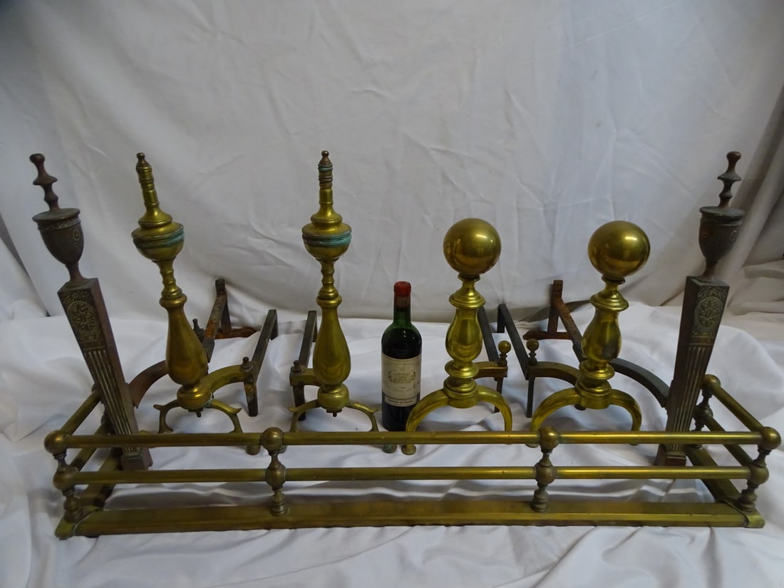 ASSEMBLED COLLECTION OF FIREPLACE ITEMS, INC.. THREE PAIRS BRASS ANDIRONS AND ONE FIRE FENDER, 22"H (1 of 19)