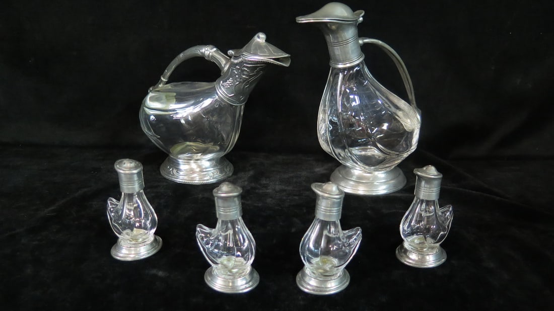 LIVING ESTATE OF JOSEPH RODANO: ETAIN ROYAL ROCK CRYSTAL "COLD DUCK" WINE DECANTERS, ROCK CRYSTAL: LIVING ESTATE OF JOSEPH RODANO: ETAIN ROYAL ROCK CRYSTAL "COLD DUCK" WINE DECANTERS, ROCK CRYSTAL AND PEWTER 9.5 X 8.5 X 4.5