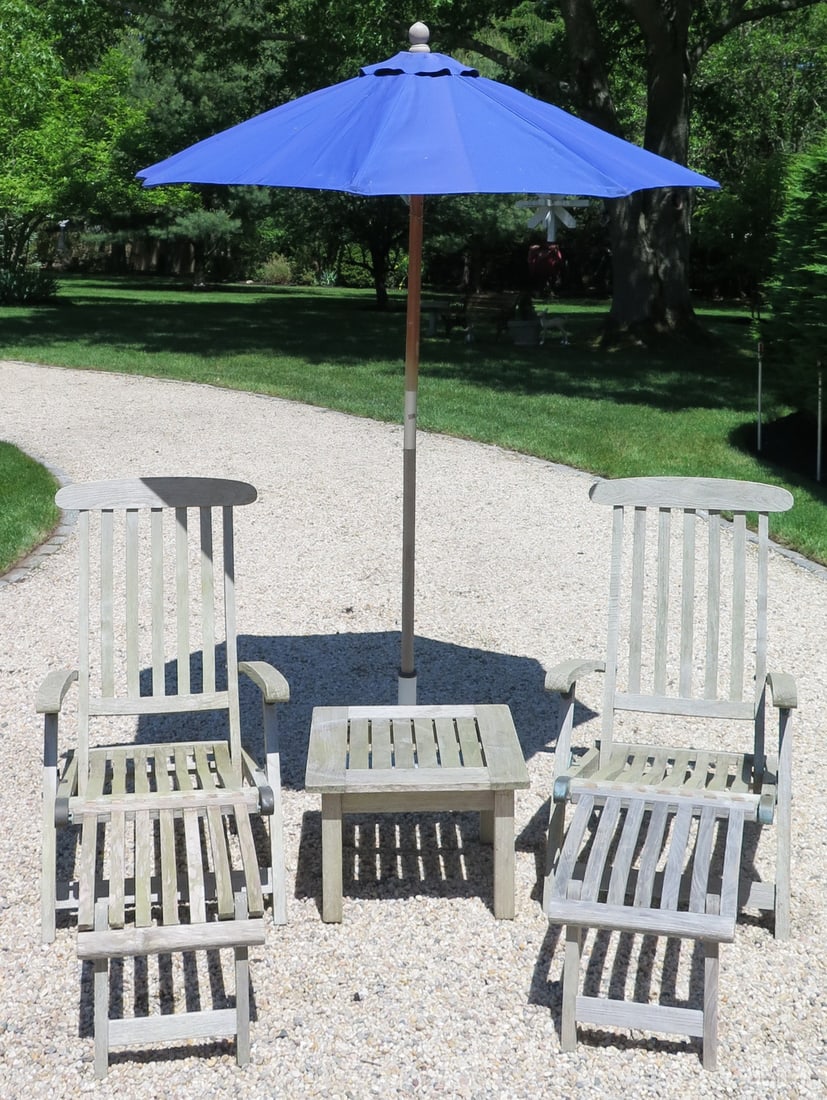 LIVING ESTATE OF JOSEPH RODANO: S. BARLOW AND TYRIE PAIR OF TEAK CHAISES, SMALL SQUARE TEAK TABLE,: LIVING ESTATE OF JOSEPH RODANO: S. BARLOW AND TYRIE PAIR OF TEAK CHAISES, SMALL SQUARE TEAK TABLE, UMBRELLA WITH STAND