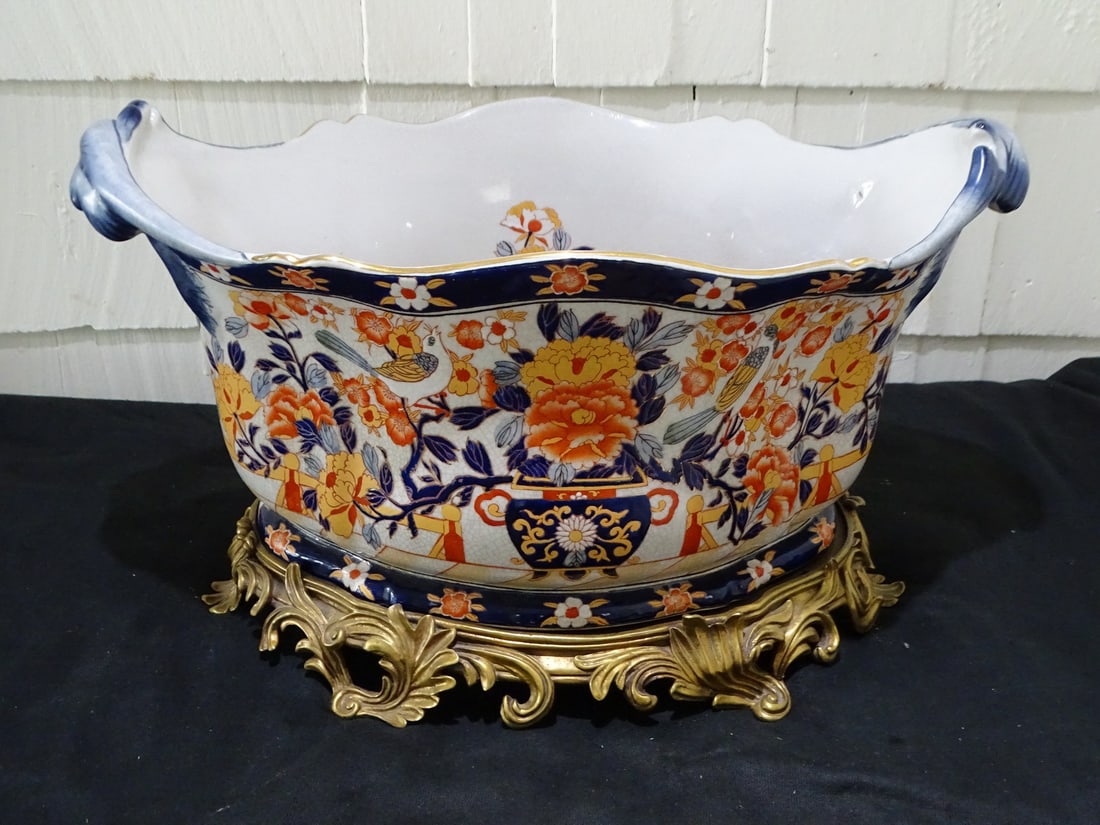 BRONZE MOUNTED IMARI PATTERNED PORCELAIN CENTER BOWL 10" X 13" X 19": BRONZE MOUNTED IMARI PATTERNED PORCELAIN CENTER BOWL 10" X 13" X 19"