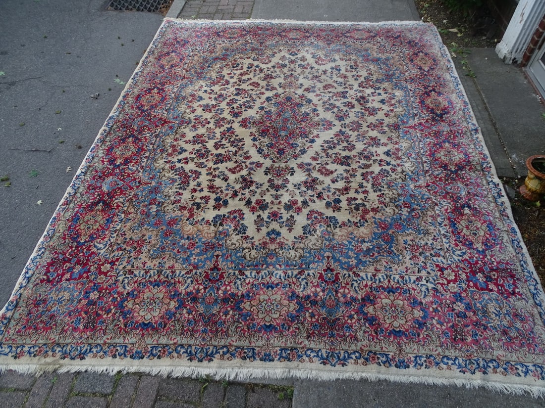 ESTATE OF DENNIS P. RODANO SR: KERMAN RUG, BEIGE GROUND WITH BLUE AND RED 11'8" X 9'7" (1 of 9)