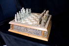 AZTEC VERSUS SPANISH FIGURAL WOOD AND RESIN CHESS SET 5 1/4" X 20" X 20"
