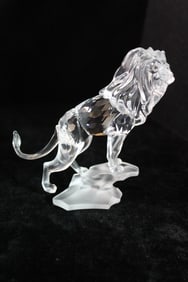 CURATED COLLECTION OF JOSEPH RODANO:TWO SWAROVSKI CRYSTAL FIGURES - LION & OYSTER W/ PEARL