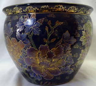 GILT AND PAINT DECORATED BLUE GLAZED POTTERY PLANTER