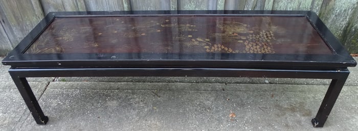 BLACK LACQUER GILT DECORATED CHINOSERIE LOW TABLE WITH GLASS TOP