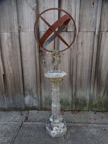 IRON, BRASS & METAL ARMILLARY SPHERE SUPPORTED BY "ATLAS" ON A CONCRETE PEDESTAL 61 1/2" HIGH,