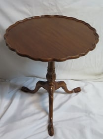 WALNUT PIE CRUST TABLE WITH TALON CARVED FEET