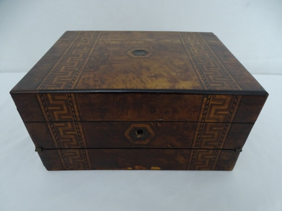 BURLED WOOD VENEER JEWELRY BOX: This exquisite burled wood veneer jewelry box is a stunning example of fine craftsmanship and elegant design. The intricate burlwood pattern, with its unique swirls and textures, creates a captivating