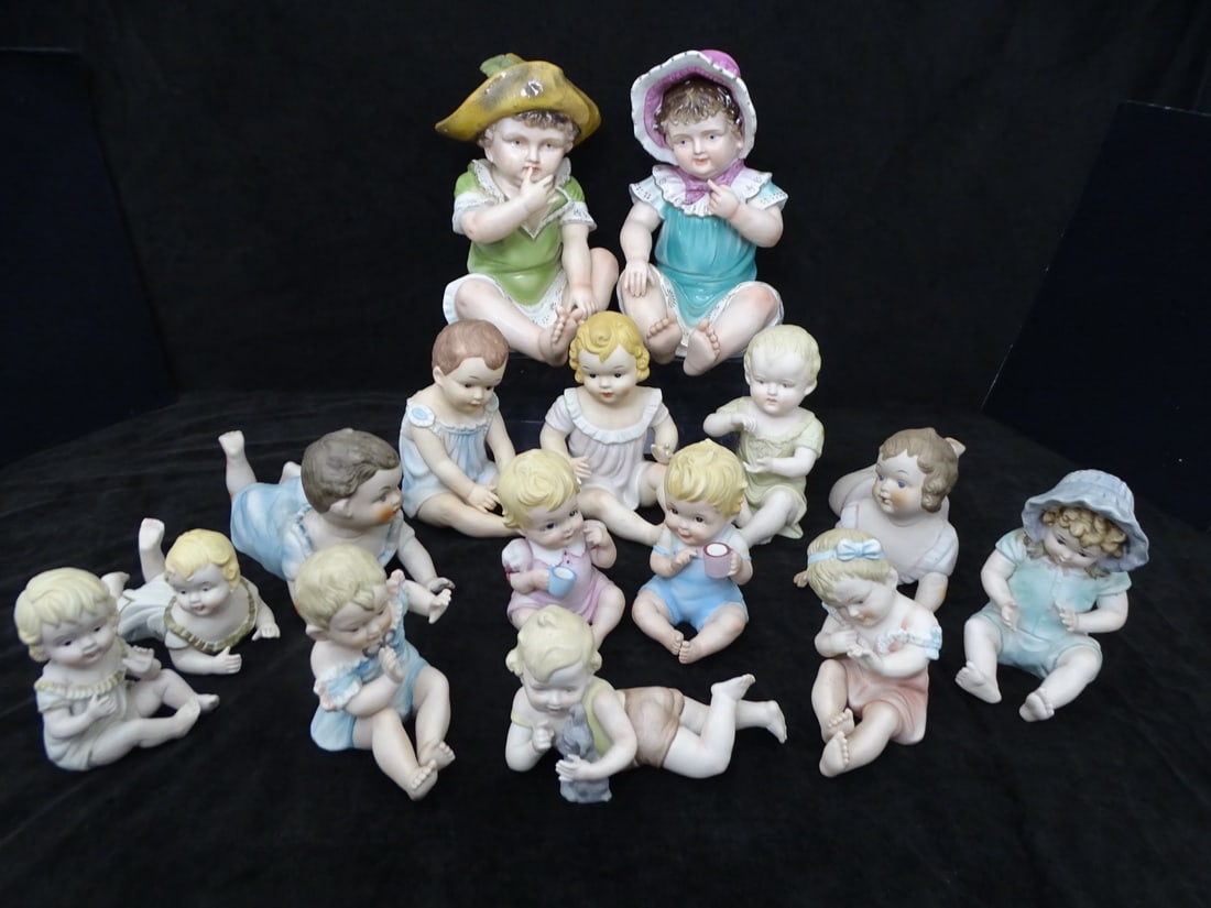 EXTENSIVE LOT OF FIFTEEN VINTAGE BISQUE PIANO BABIES (1 of 15)