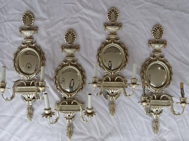 SET OF FOUR HOLLYWOOD REGENCY SILVER GILT AND MIRROR ITALIANATE SCONCES