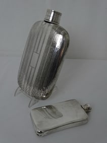 TWO STERLING SILVER FLASKS INCLUDING EXCEPTIONAL HAND HAMMERED FLASK WITH TELESCOPING CUP/LID