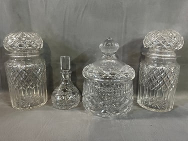 LIVING ESTATE OF JOSEPH RODANO: COLLECTION OF FOUR LIDDED CRYSTAL CONTAINERS