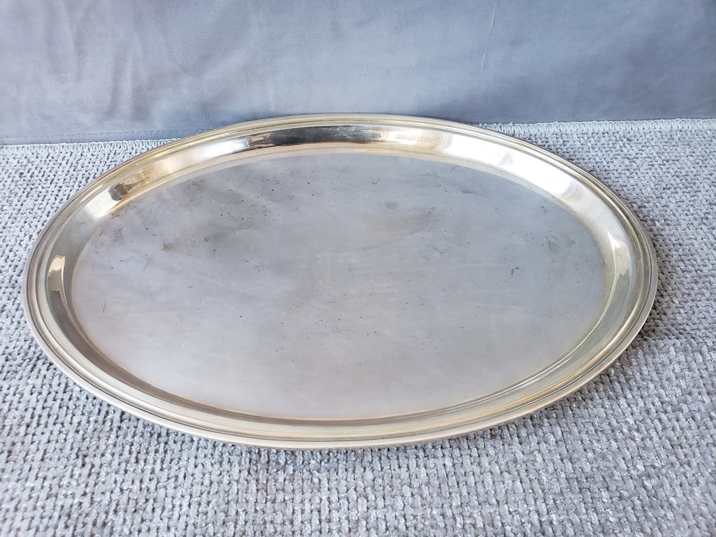 SUBSTANTIAL 800 SILVER OVAL TRAY (26.3 OZT) 15 X 11: This substantial 800 silver oval tray, weighing in at 26.3 ounces, is a testament to the beauty and durability of fine silver. The generous dimensions, measuring 15 inches by 11 inches, make it perfec