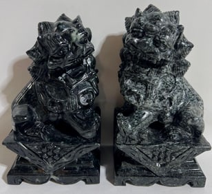 PAIR OF STONE LION BOOKENDS