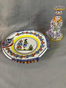 TWO PIECES OF FRENCH PORCELAIN | ONE QUIMPER PLATE WITH FISH MOTIF | ONE E. BRETON CANDLESTICK