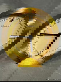 LIVING ESTATE OF JOSEPH RODANO: TIFFANY & CO ROUND BRASS QUARTZ SWISS MADE ALARM CLOCK