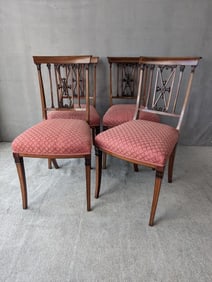 SET OF FOUR IMPRESSIVELY CARVED AND INLAID ANTIQUE MAHOGANY SIDE CHAIRS